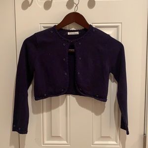 Cardigan with grey pearls, one button in front